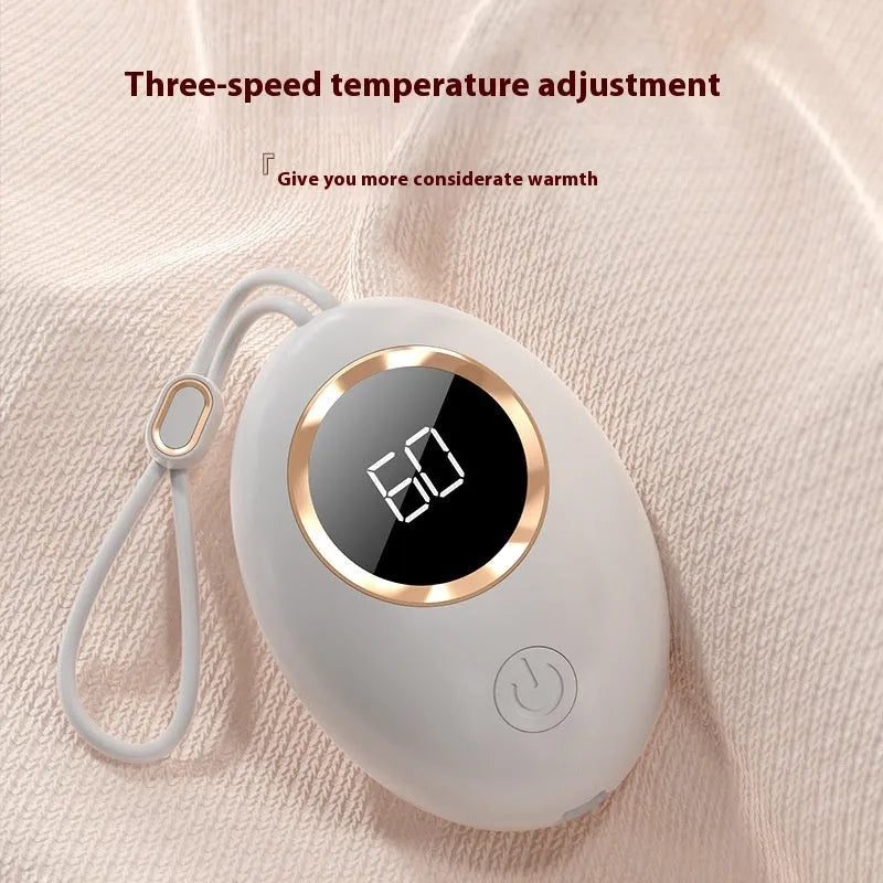 Compact USB-powered hand warmer with digital display in various colour options.