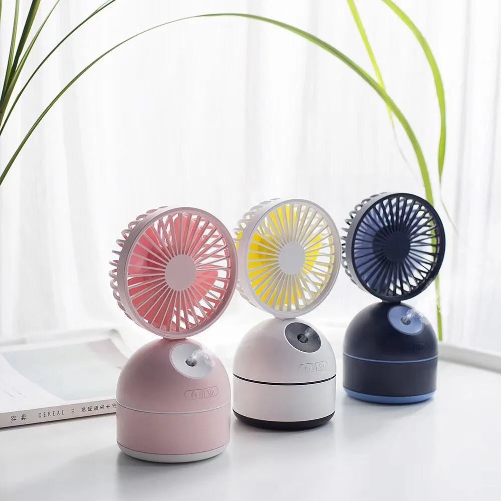 Mini USB fan humidifier in white, side view showing fan blades and mist nozzle