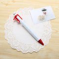 Orange multifunction ballpoint pen with integrated vernier caliper measurement tool showing 15cm length