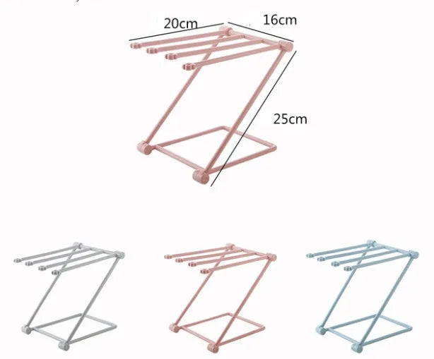 Foldable plastic dishcloth shelf in light blue with bottles stored vertically