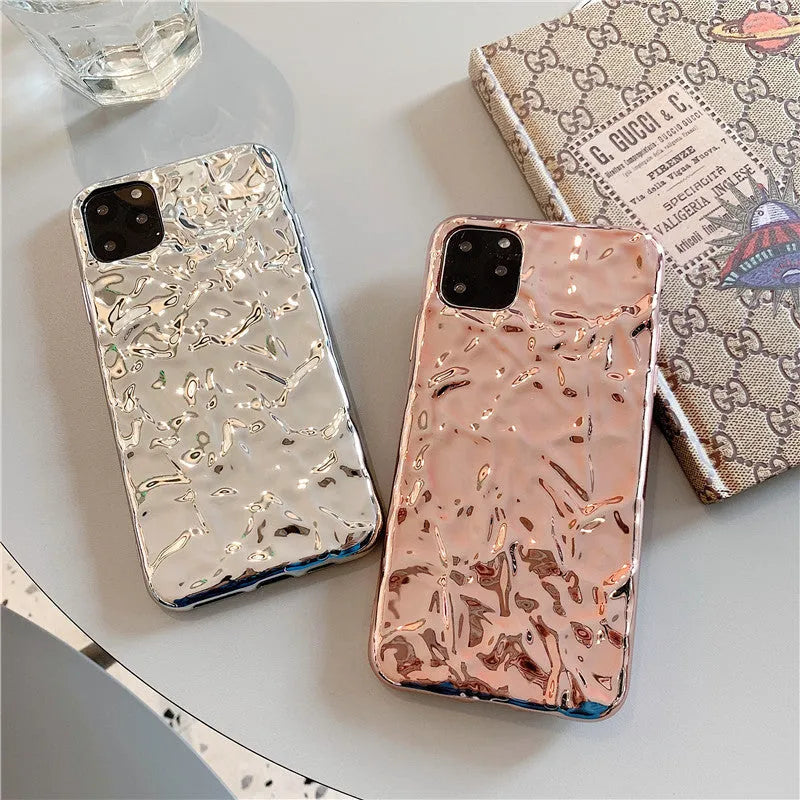 Rose gold electroplated TPU back cover case shown on an iPhone 15 Pro Max.