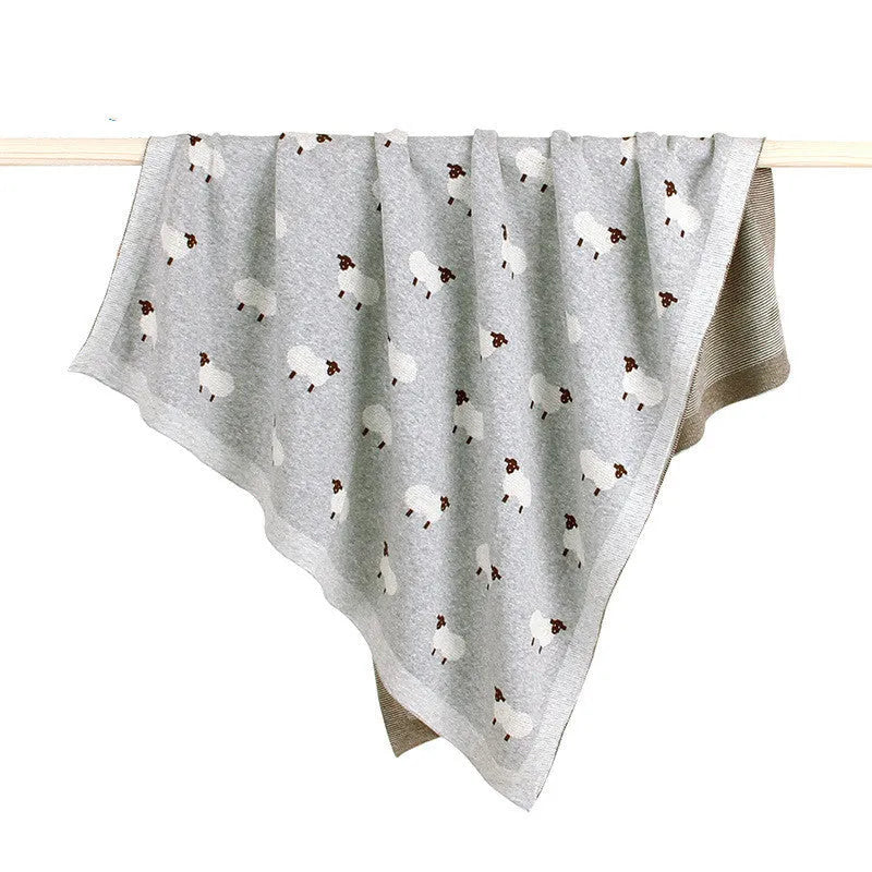 Grey and pink 100x80 cm cotton baby sheepskin blanket laid flat, suitable as a pram or cot cover.