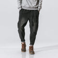 Punk stretch bike denim jeans in solid colour with elastic waist and patches