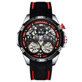 Blue automatic mechanical men's watch with luminous hands and a hollow skeleton dial on a wrist.