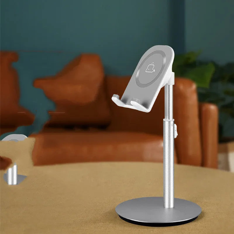 Silver metal desktop phone and tablet holder model S1 on a desk, showing a device held upright.