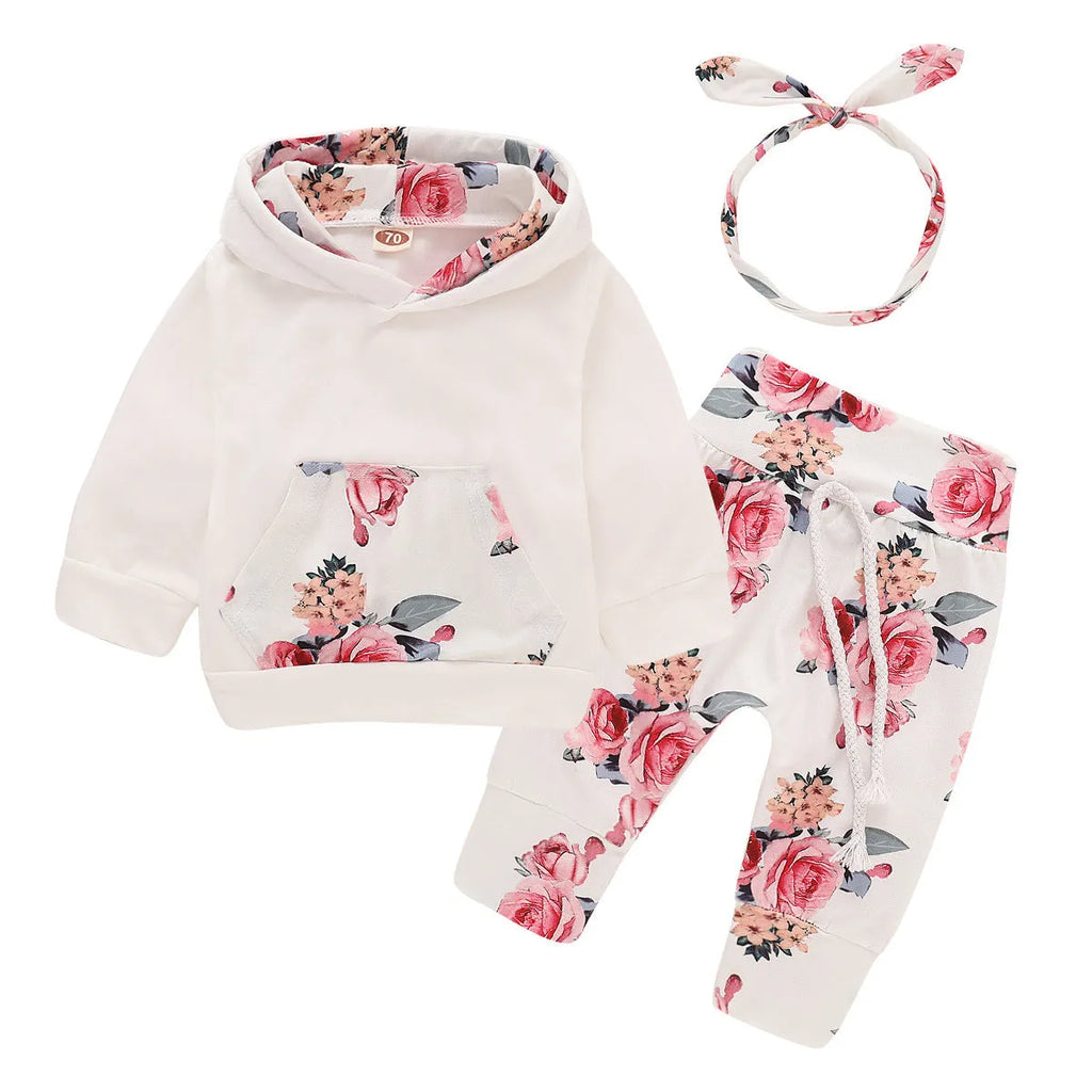 White 100% cotton hooded playsuit for a baby, showing long sleeves, trousers, and pullover neck.