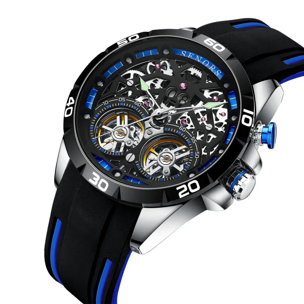 Blue automatic mechanical men's watch with luminous hands and a hollow skeleton dial on a wrist.