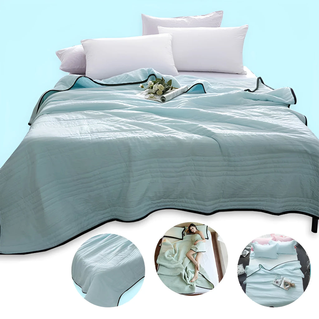 Plain colour seersucker summer cooling quilt shown in light pink on a bed.