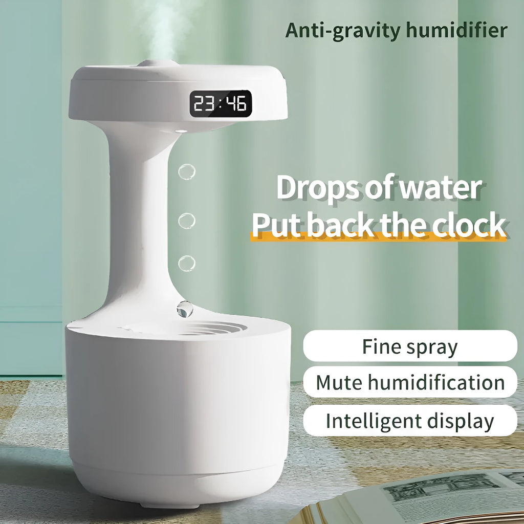 Bedroom anti-gravity humidifier with clock and backflow aroma diffuser in white plastic on desk with LED display