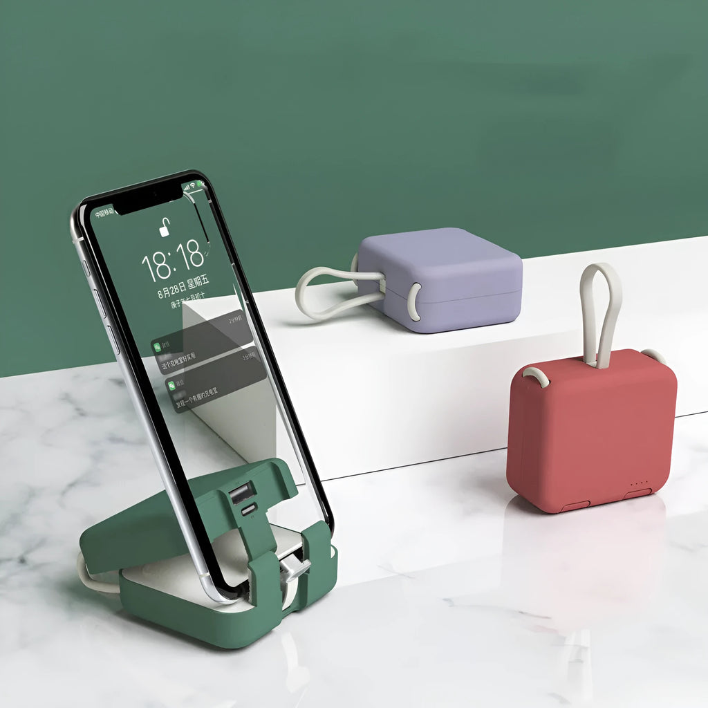 Handbag clip-on power bank with phone stand function in blue, green, red, or white.