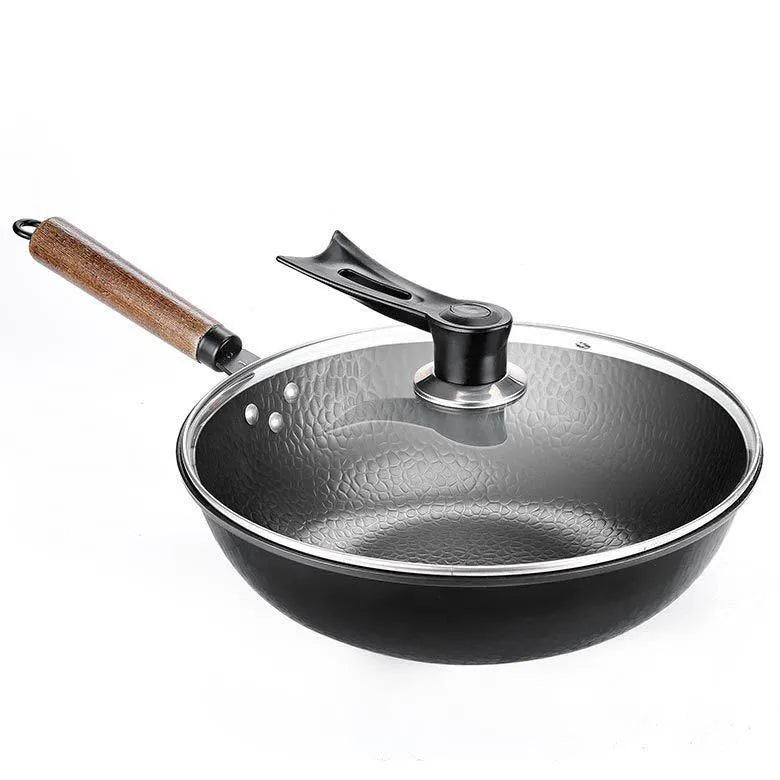 Black handmade iron wok pan with wooden handle, 40cm diameter cooking surface