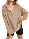 Women's loose fit long sleeve raglan sweater in solid peacock green colour, casual pullover style.