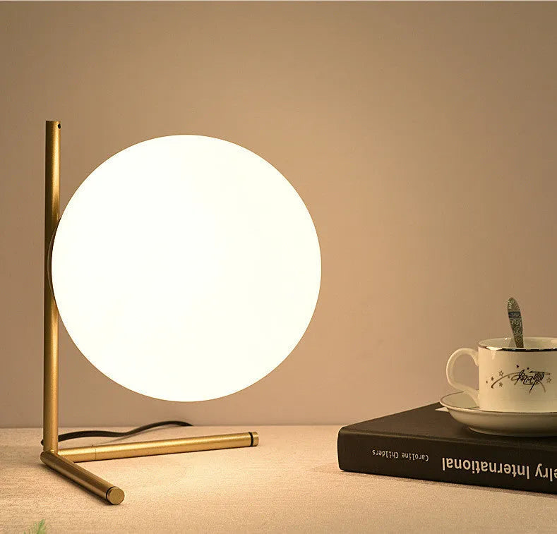 Glass shade LED table or floor lamp in one of three size options for living room or study.