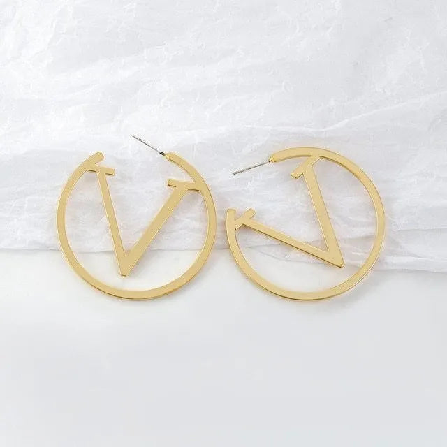 Women's simulated pearl and alloy earrings in gold colour, geometric shape