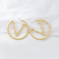 Women's simulated pearl and alloy earrings in gold colour, geometric shape
