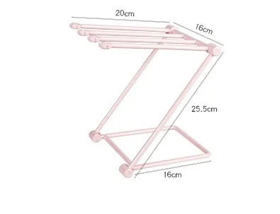 Foldable plastic dishcloth shelf in light blue with bottles stored vertically