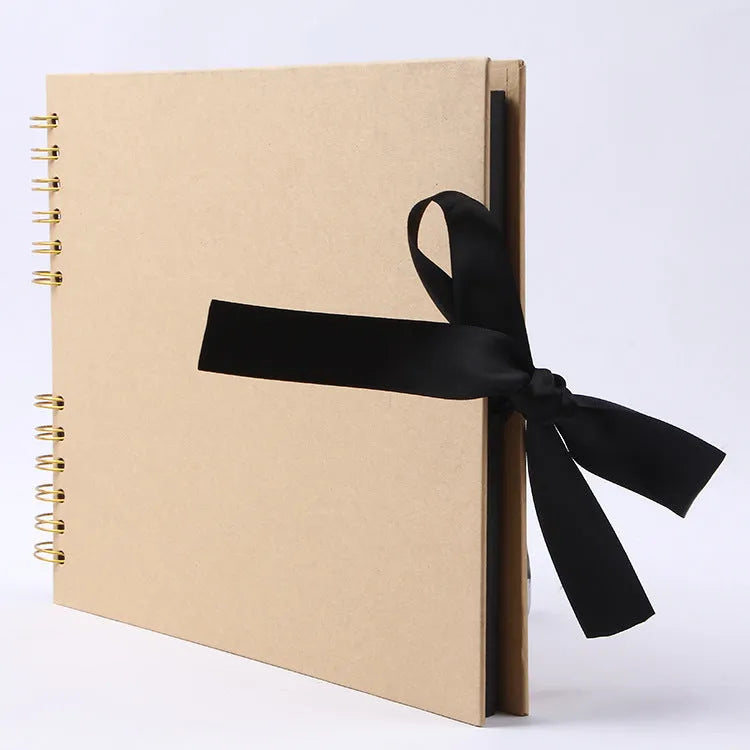 Handmade DIY photo album with black cardboard and Kraft paper cover, showing coil binding and yellow colour option.