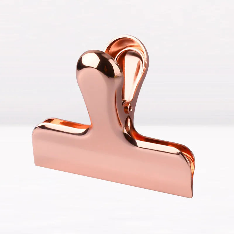 Gold stainless steel dovetail clip on white paper, 7.6x6cm, 430 steel, vacuum-plated finish