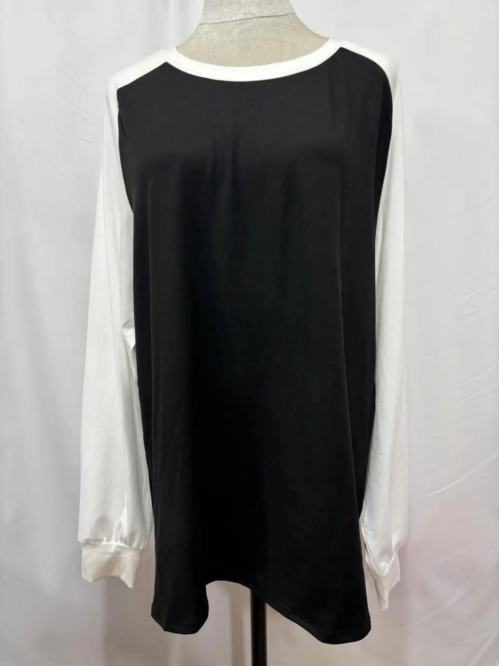 Long sleeve round neck polyester T-shirt shown in black, blue, grey, and pink colours