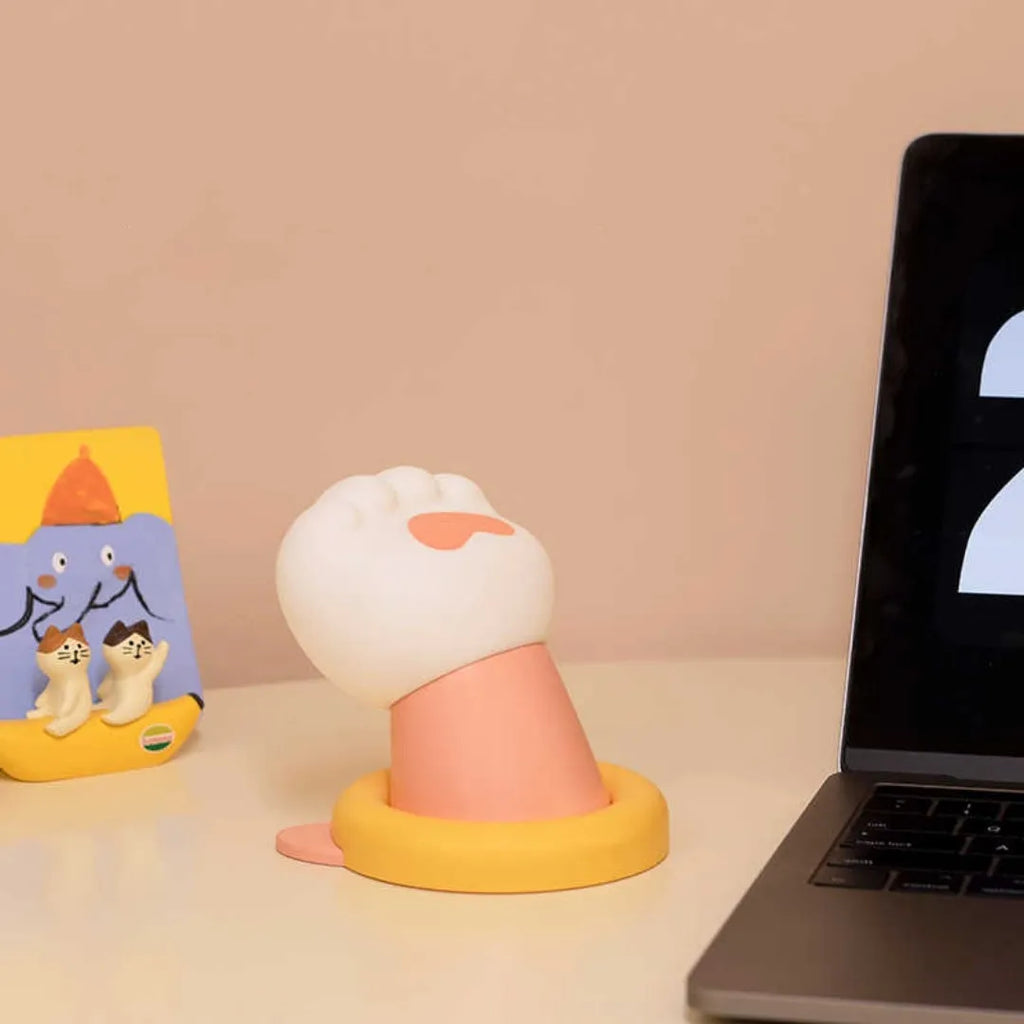 Rechargeable cat paw touch desk lamp with outstretched claw design.