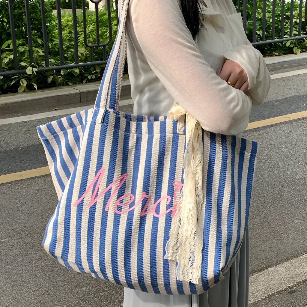 Blue striped letters printed cotton canvas bag in pink, blue and white stripes.