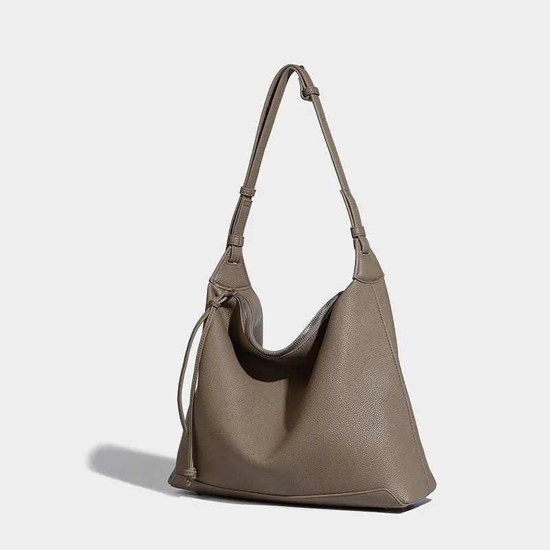 Caramel coloured soft PU messenger bag with underarm shoulder strap