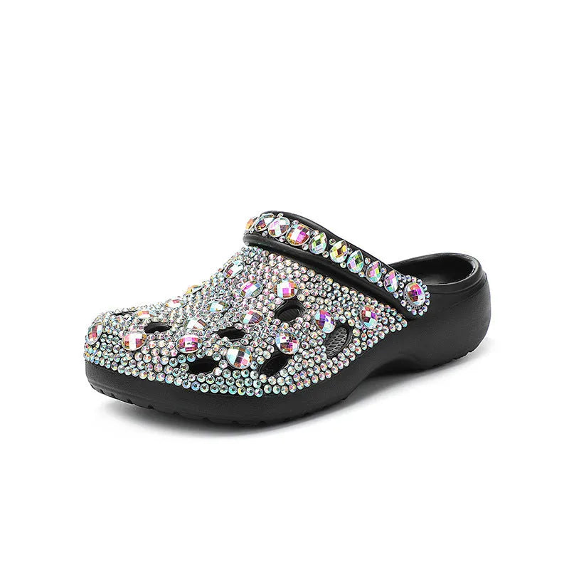 Black women's platform sandals with rhinestone straps and a textured EVA sole.