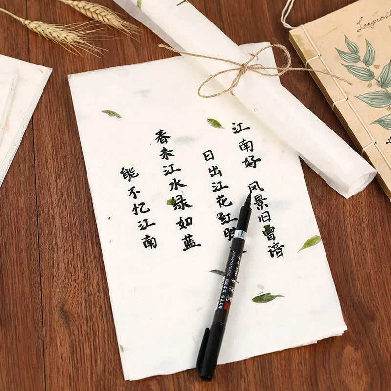 Ten sheets of ancient Chinese style painting paper for calligraphy in Green Leaf, Green Silk, Safflower, and Yellow Flower colours.
