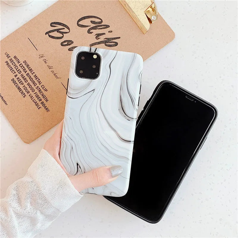Marble mobile phone case for iPhone in black and white soft shell design, showing fade-resistant pattern