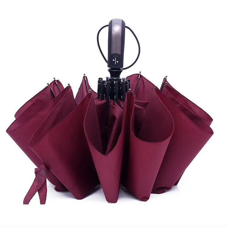 Black triple folding automatic sun-shade umbrella with steel ribs, shown open.