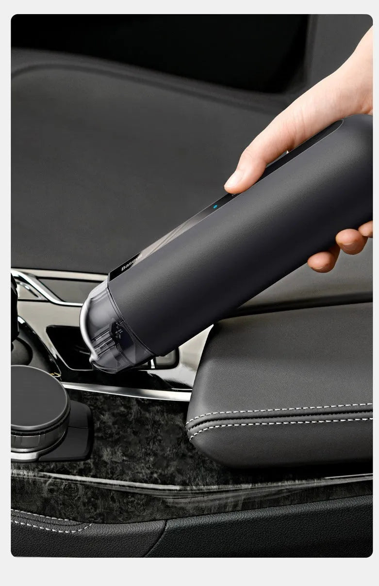 Baseus wireless handheld car vacuum cleaner in black, white, or green with blowing hose attachment.