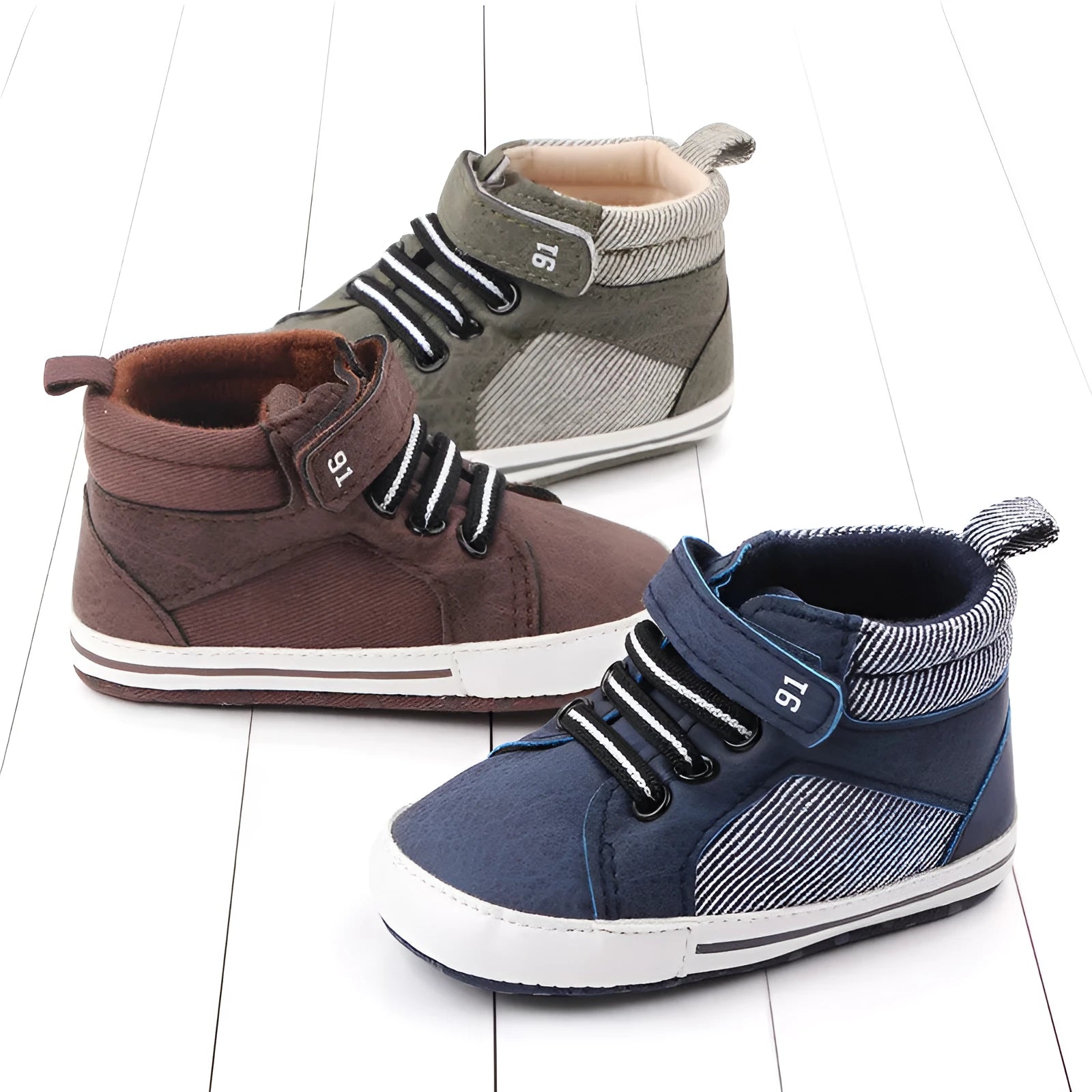 Blue high-top cotton toddler shoes for boys with a Velcro strap fastening.