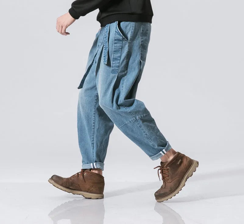 Punk stretch bike denim jeans in solid colour with elastic waist and patches