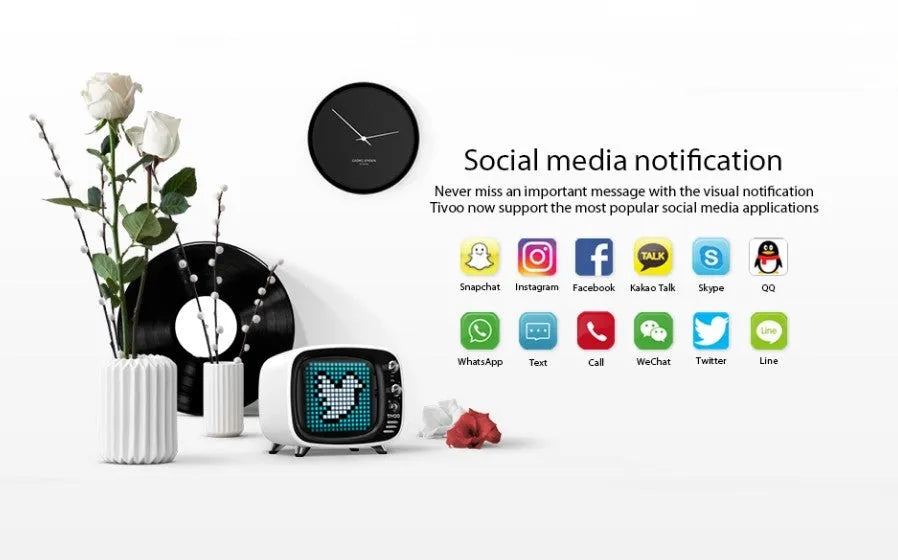 Portable Bluetooth speaker with alarm clock functions in black, blue, green, pink, red, or white colours