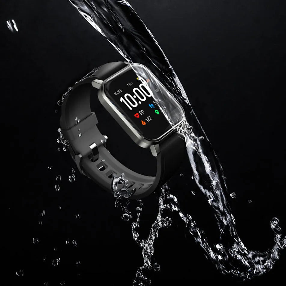 Black waterproof smart bracelet with 1.4 inch screen and silicone strap on a wrist