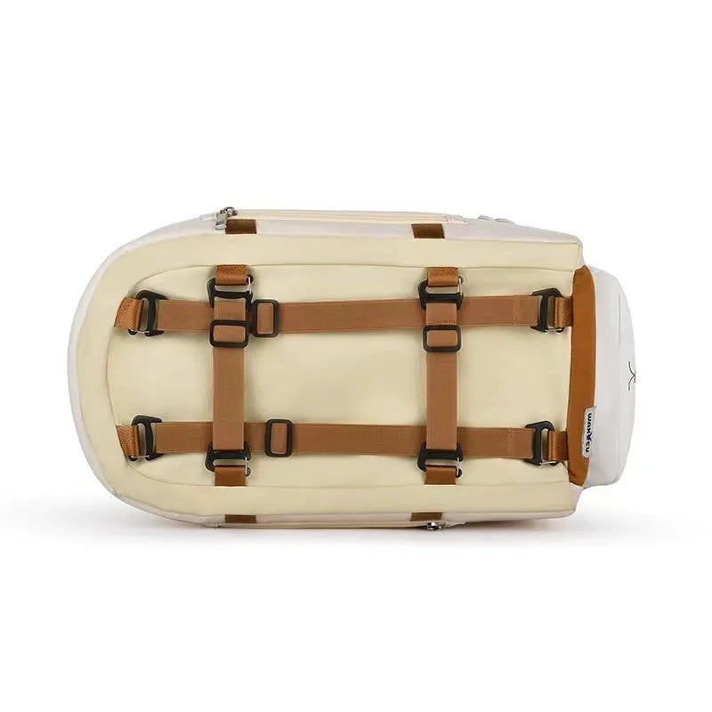 Beige hard-sided pet flight case with one shoulder strap, dimensions 43x25x22.5cm.