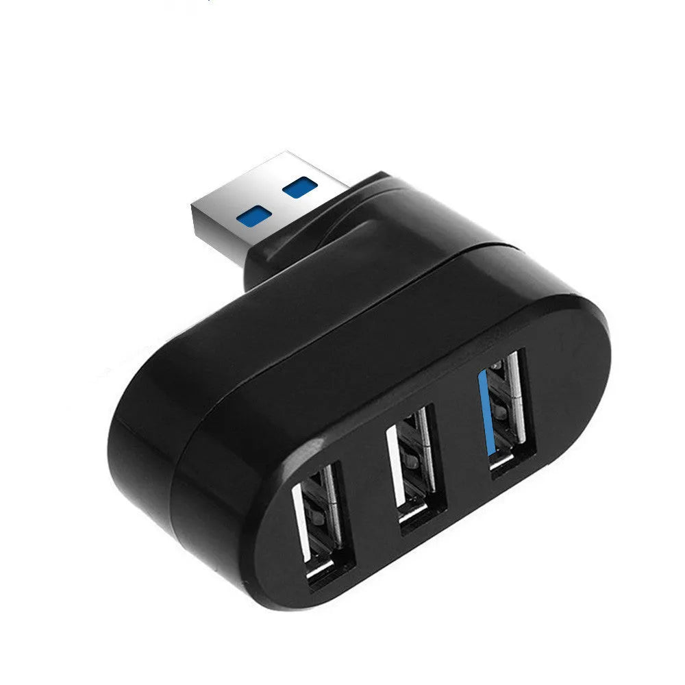 Black or white USB rotary splitter hub with four USB 3.0 ports on a desktop