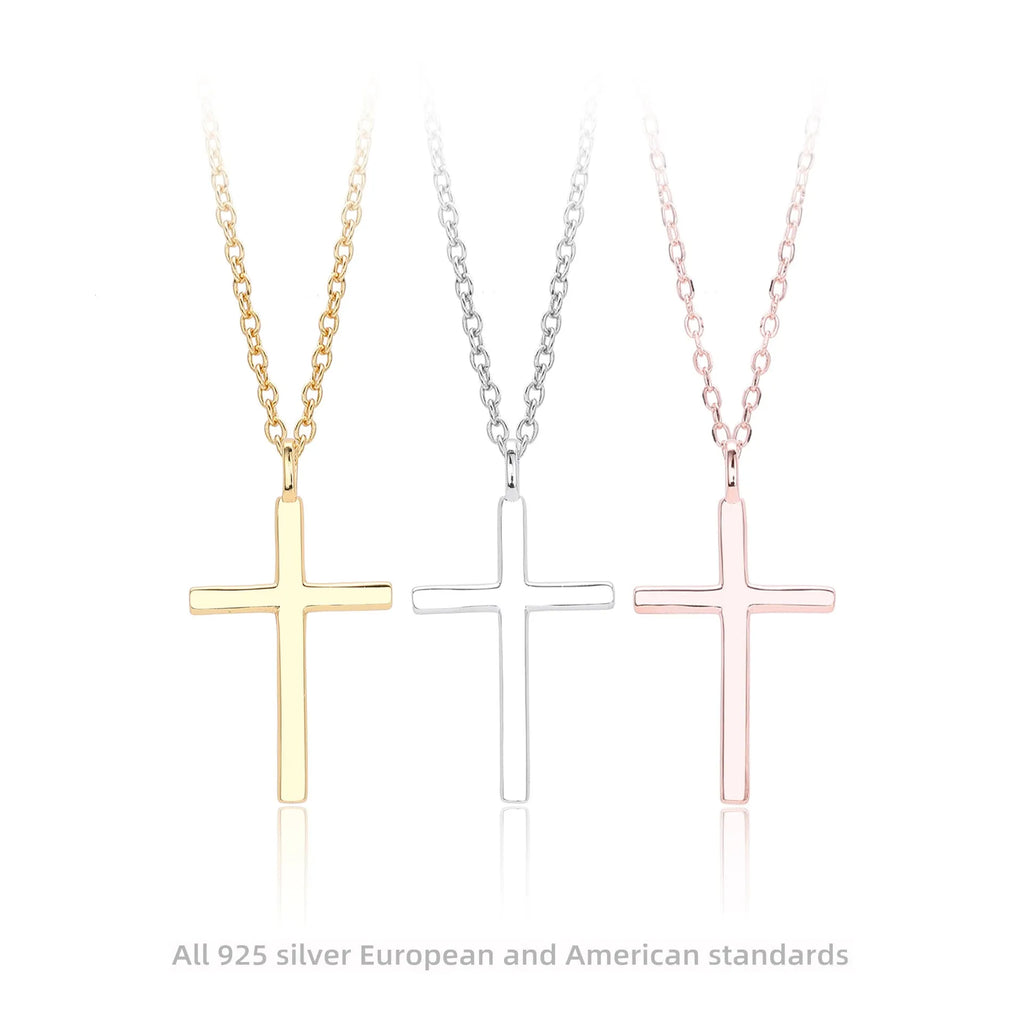 Sterling silver necklace with cross pendant on O-shaped chain showing gold electroplated finish