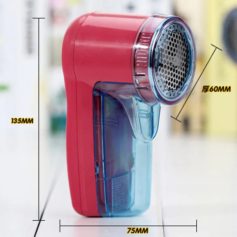 Portable electric lint remover device for removing pills from clothing and sweaters