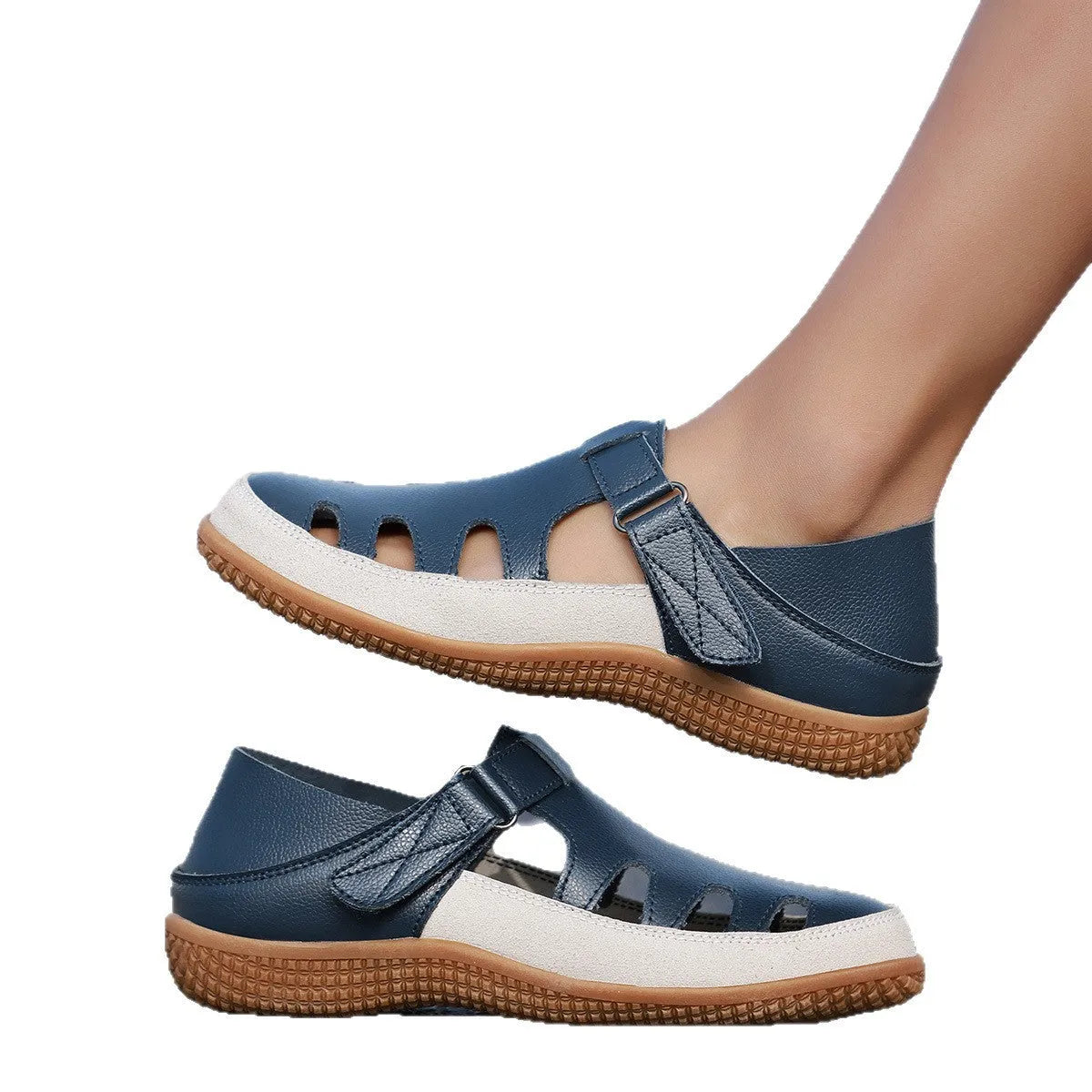 Plus size white women's sandals with hollow toe design and thick flat rubber sole.