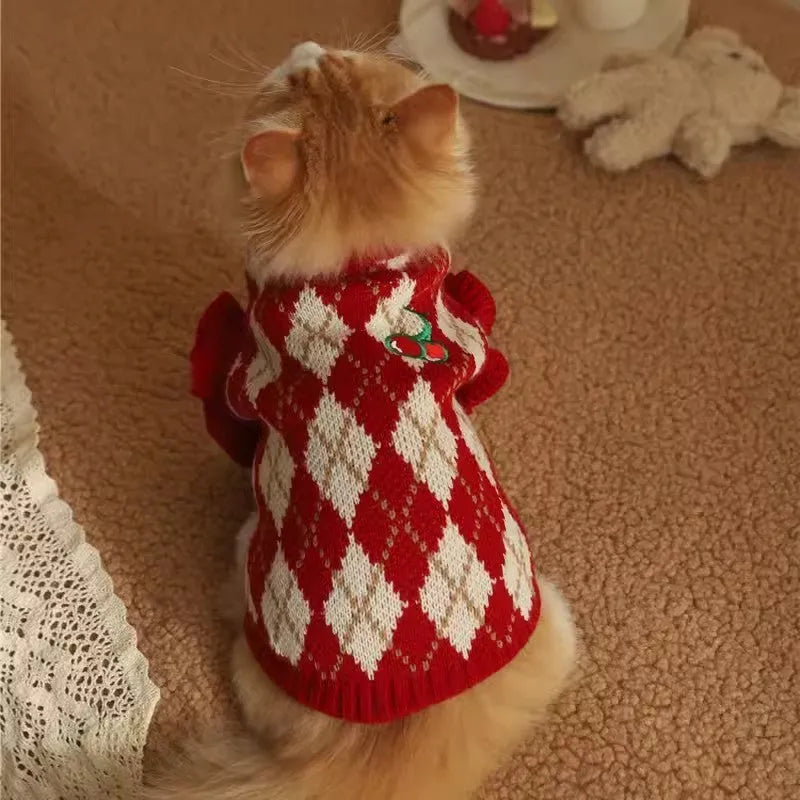 Red cat sweater with cherry pattern and rhombic embroidery, shown on a model cat.
