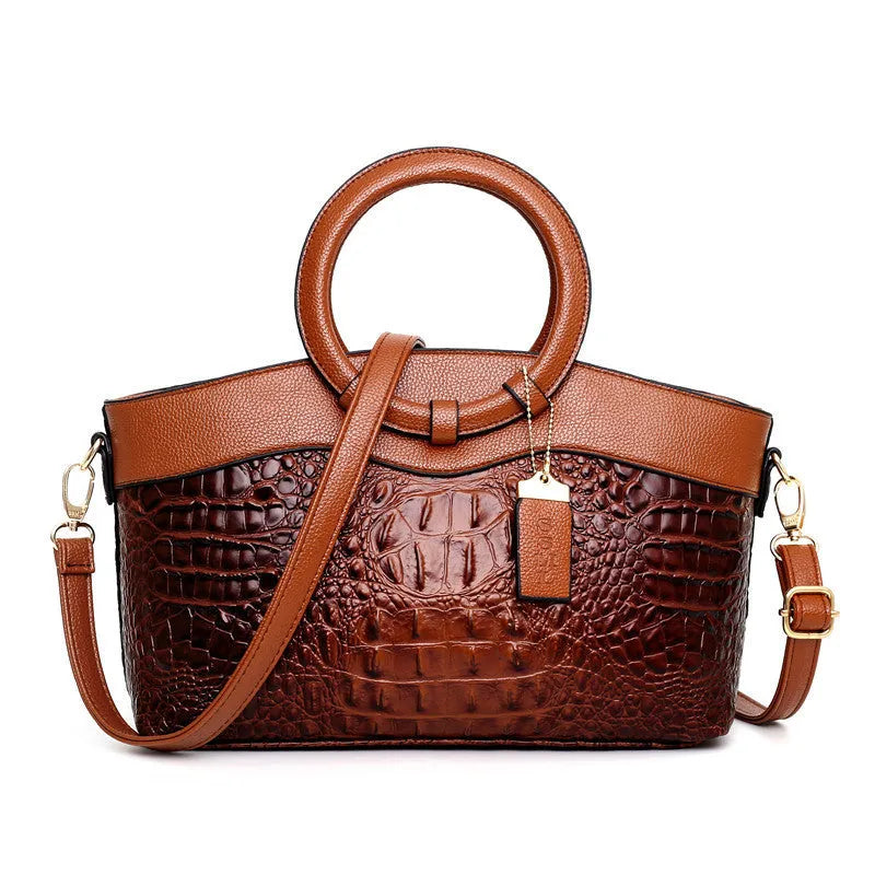 31cm wide fabric ladies shoulder handbag showing zipper compartments and available in six colour variations