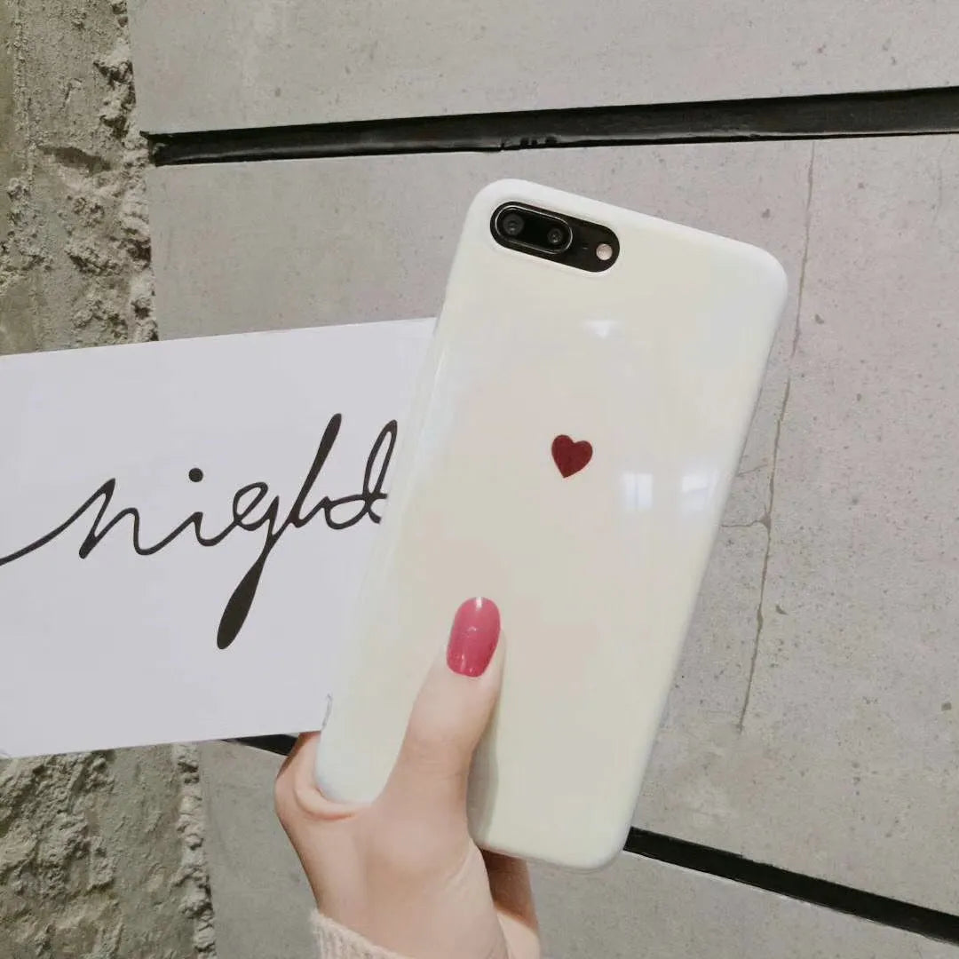 Slim white hard back cover case for iPhone X, shown next to a Bluwhite variant.