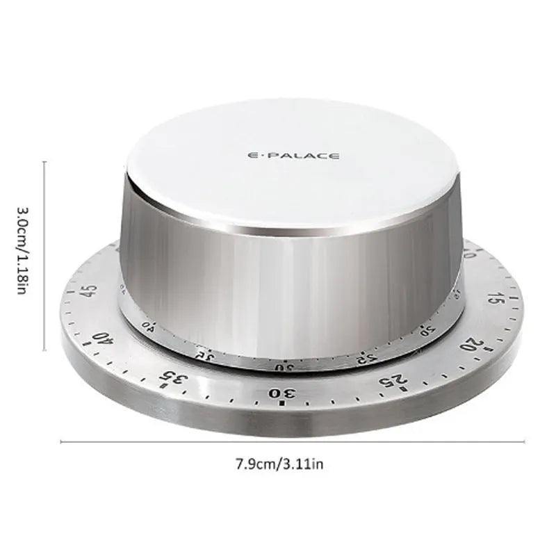 Green kitchen stainless steel mechanical timer with 60-minute dial on metal surface