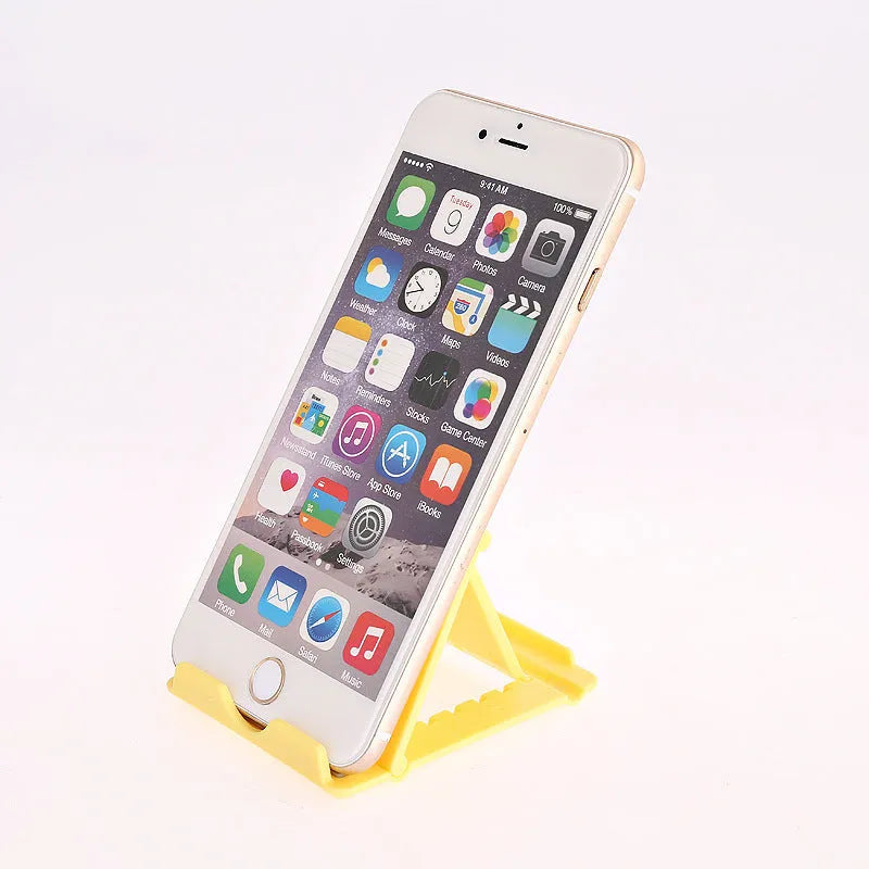 Folding mobile phone and tablet bracket in black, 83 x 71 x 7 mm, made from ABS and silicone