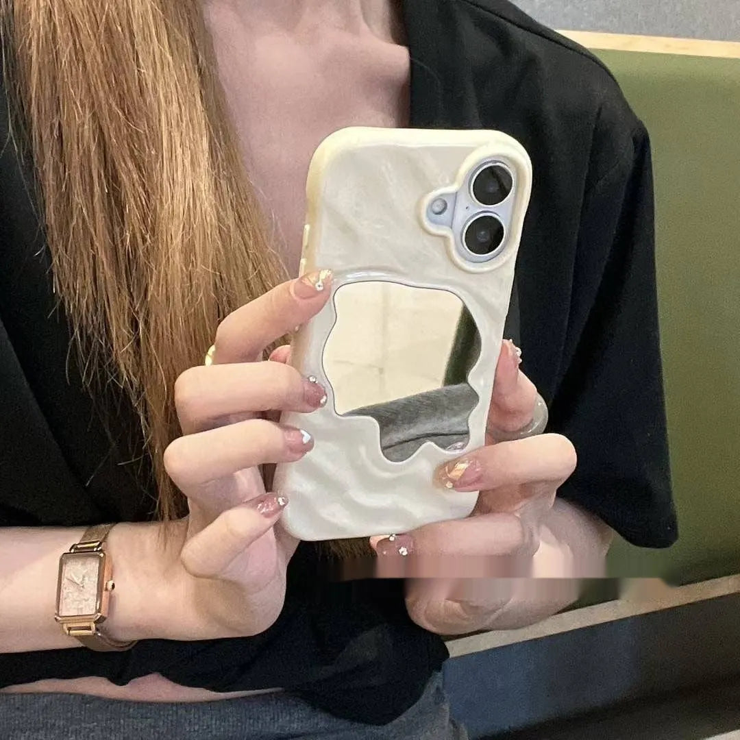 iPhone phone case with water ripple texture and a solid colour mirror back on a table