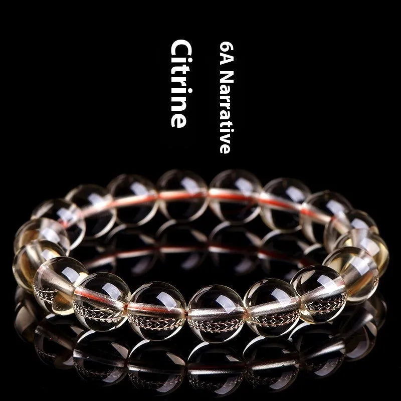 Natural citrine scattered bead bracelet in 7A grade on a wrist, showing polished stones and original design.