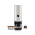 Handheld portable electric coffee machine in Jungle Green colour with car charger cable.