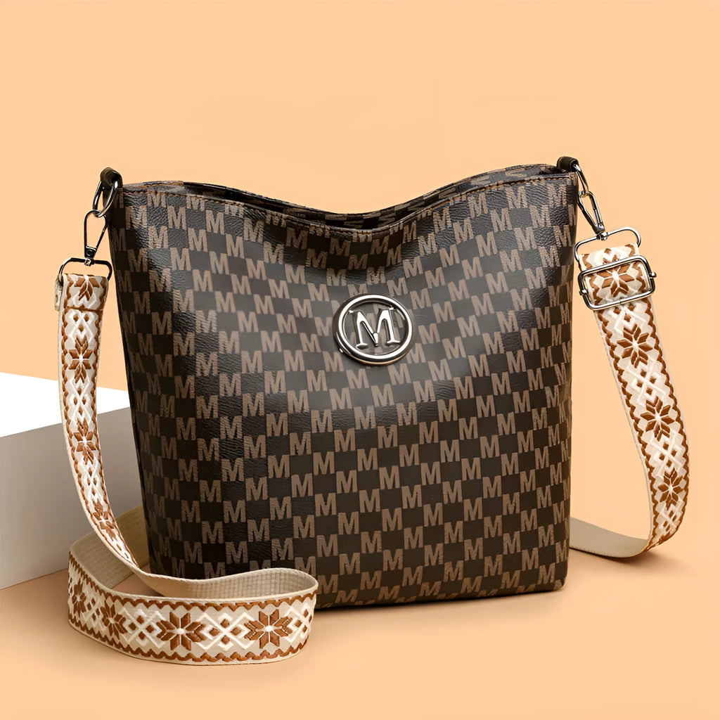PU leather dumpling shape shoulder bag with sandwich pockets and zippered compartment