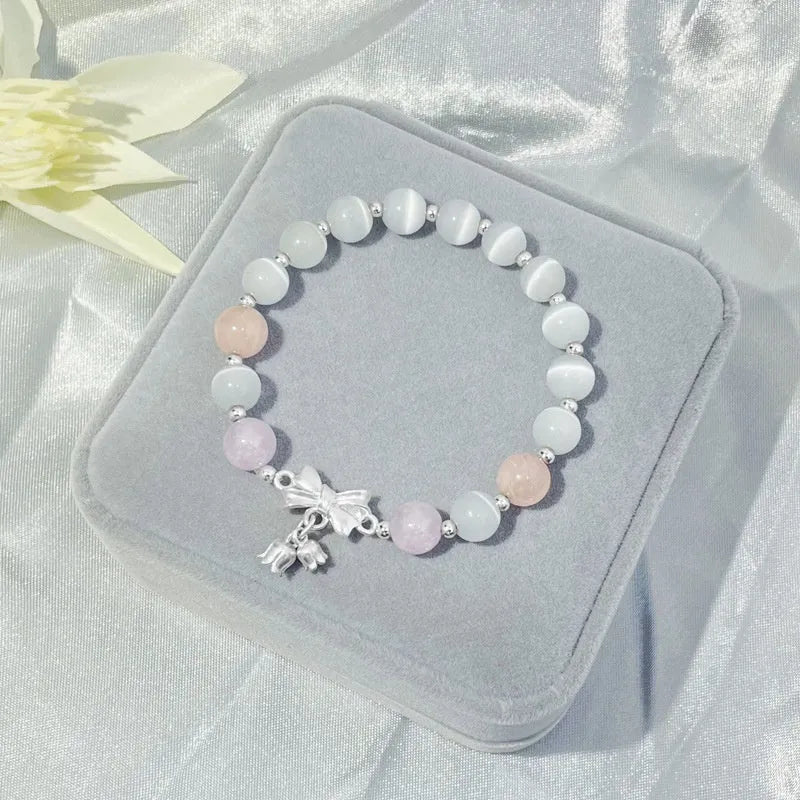 Lavender purple bowknot opal crystal bracelet with electroplated finish for women.